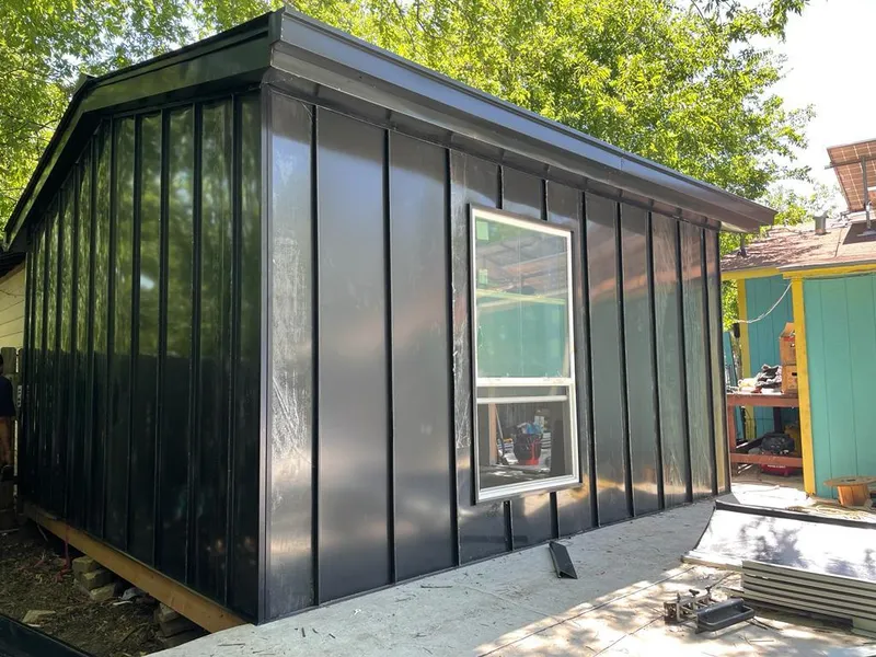 Black standing seam metal wall panels for Metal Roof Installation in Bluefield