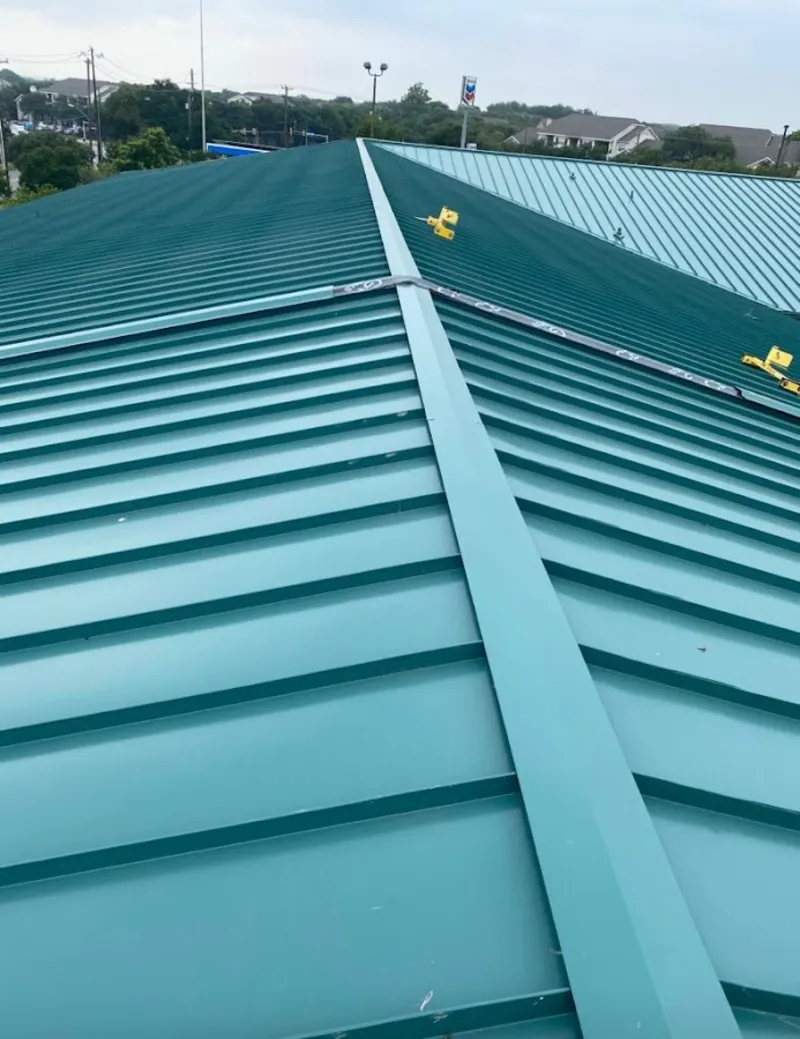 Green commercial metal roof ridge and valley for Metal Roof Repair in Bluefield